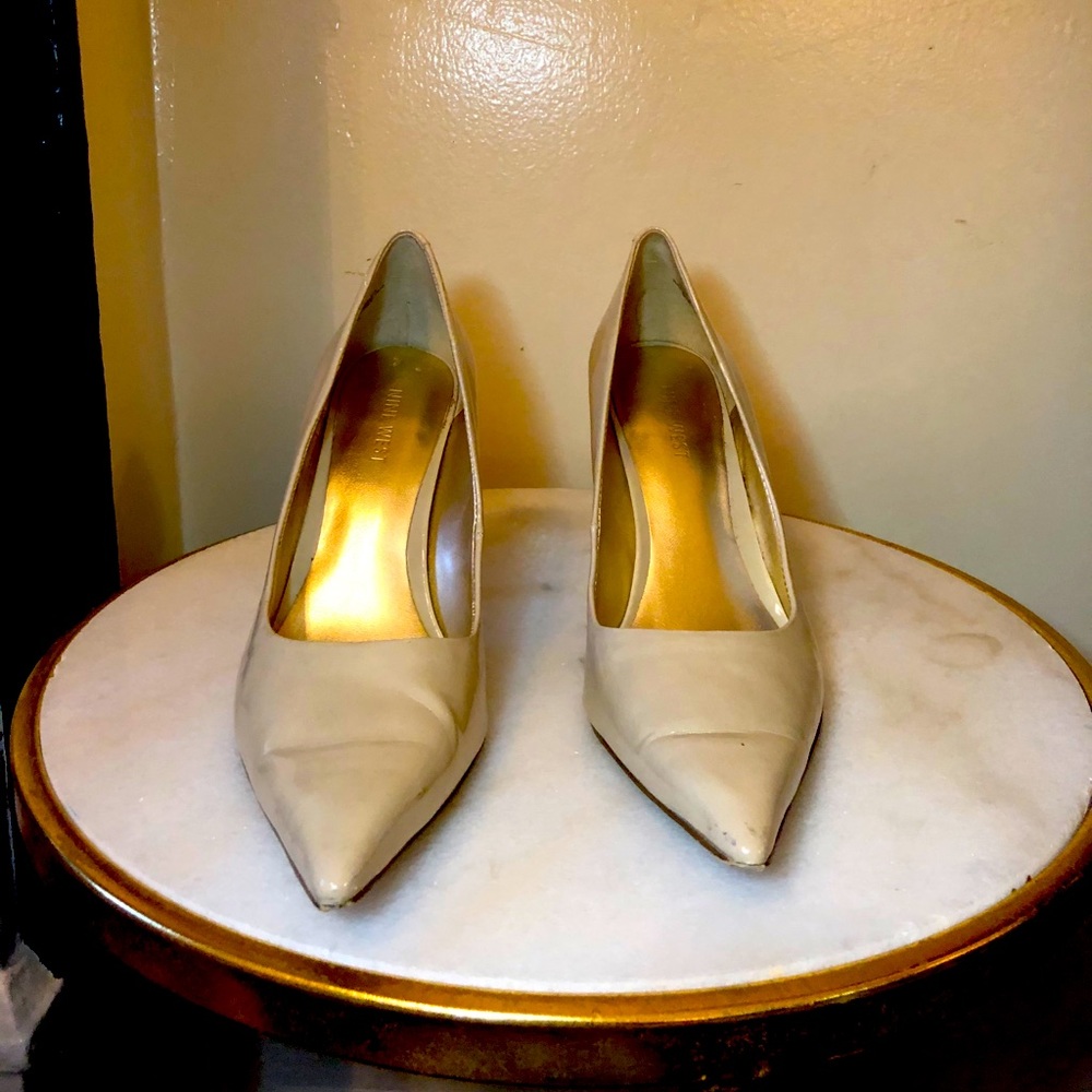 Nude Nine West heels. Mildly marked up.